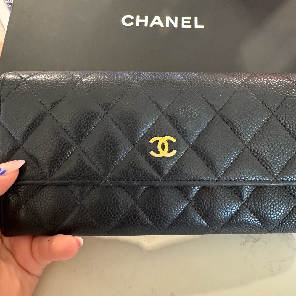 CHANEL Black Quilted Wallet with Gold Logo